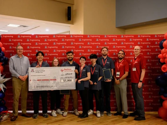 University of Arizona Design Day Team 24009 celebrates their $5,000 award from Raytheon Technologies for Best Overall Design for their multi-legged robot.