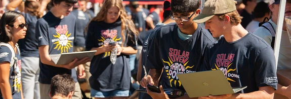 student participating in Solar Oven Throwdown