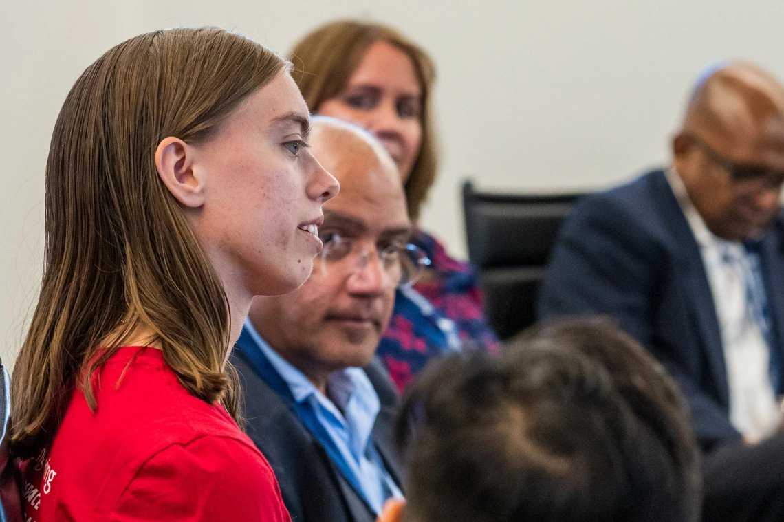 closeup of people in conference room
