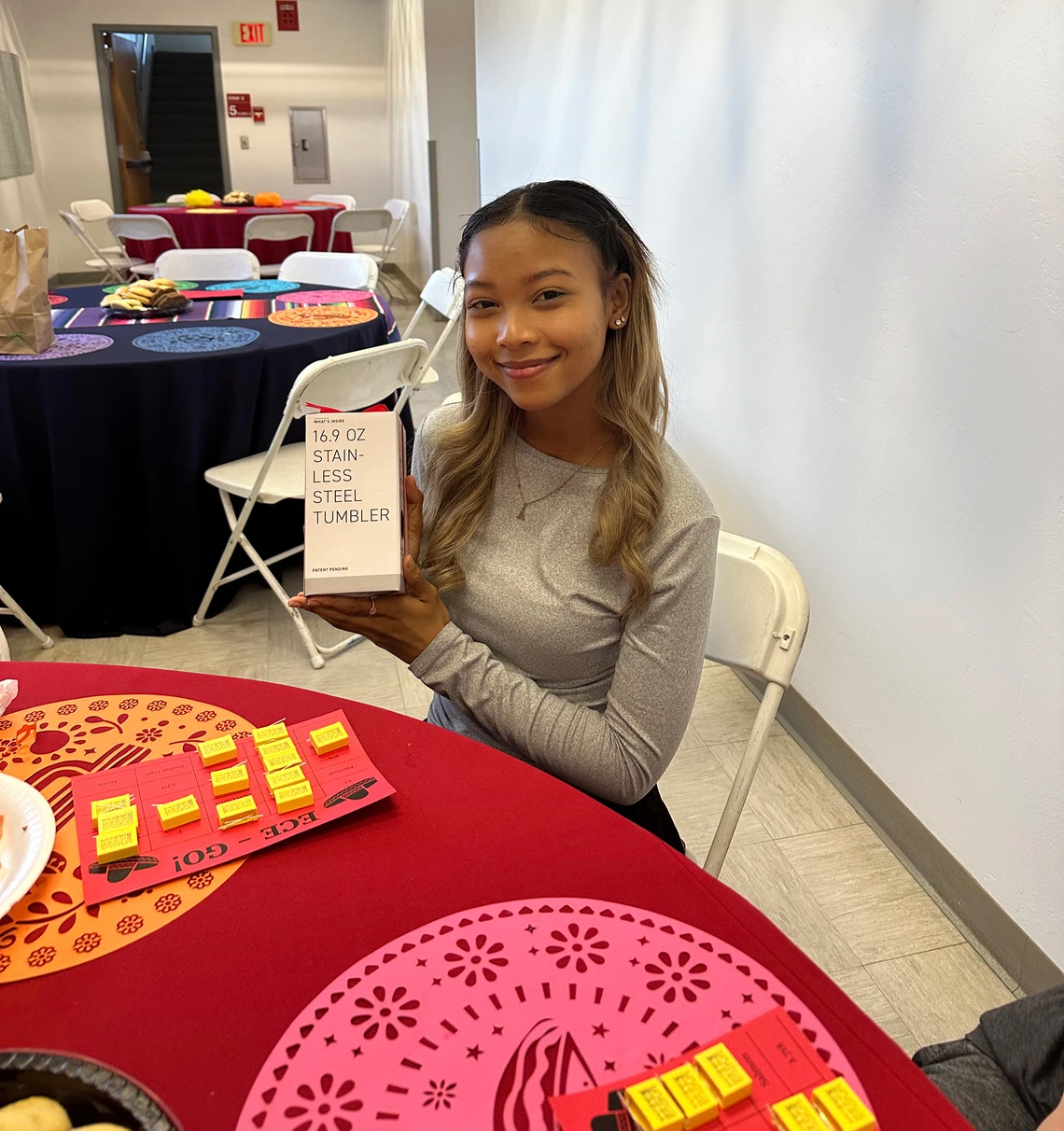 person holding prize