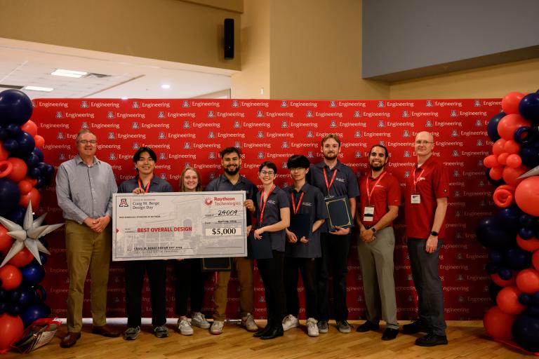 Electrical and computer engineering students in the College of Engineering are presented an award at Design Day.